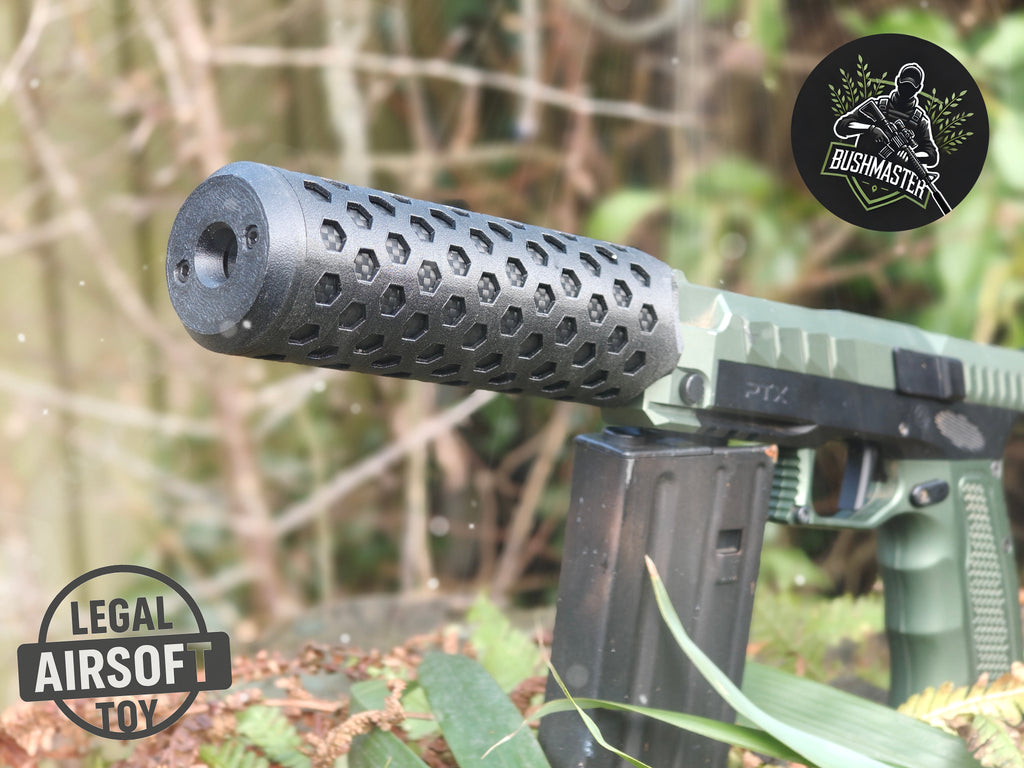 Front angled view of the Bushmaster Model HEX sound moderator mounted on a green Gate PTX airsoft pistol