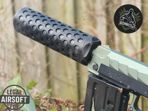 Bushmaster Model HEX sound moderator with honeycomb outer shell mounted on a green Gate PTX airsoft pistol